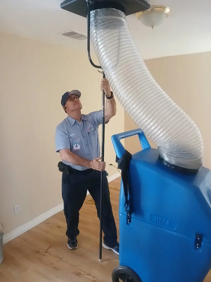 Mini Split Installation technician using HEPA equipment in South Ogden